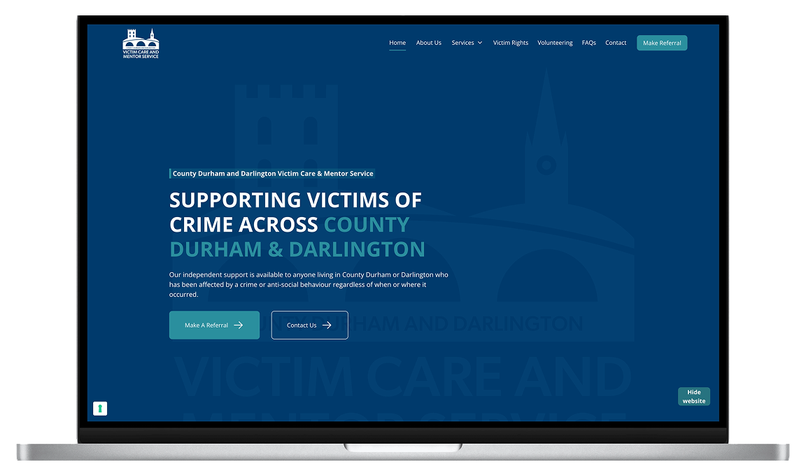 Victim Care & Mentor Service website on a MacBook